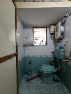Bathroom in 2 BHK Apartment at Vastu Anand Apartment, Kalwa – for Rent