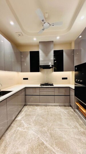 Kitchen in 3.5 BHK Builder Floor at Ansal API Versalia, Sector 67a – for Sale