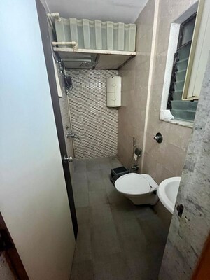 Bathroom in 2 BHK Apartment at Shiv Tilak CHS, Goregaon West – for Rent