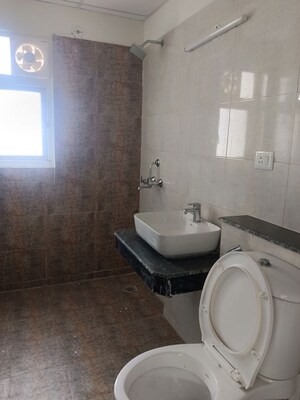 Bathroom in 2 BHK Apartment at Shri Radha Aqua Garden, Sector 16b Greater Noida – for Rent