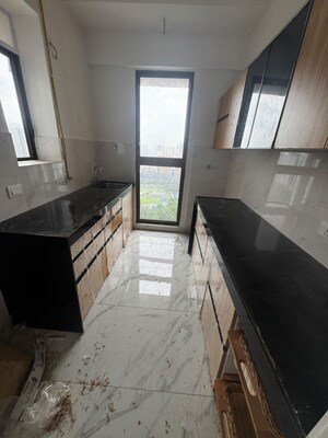 Kitchen in 2 BHK Apartment at Raymond Ten X Habitat, Pokhran Road No Two – for Rent