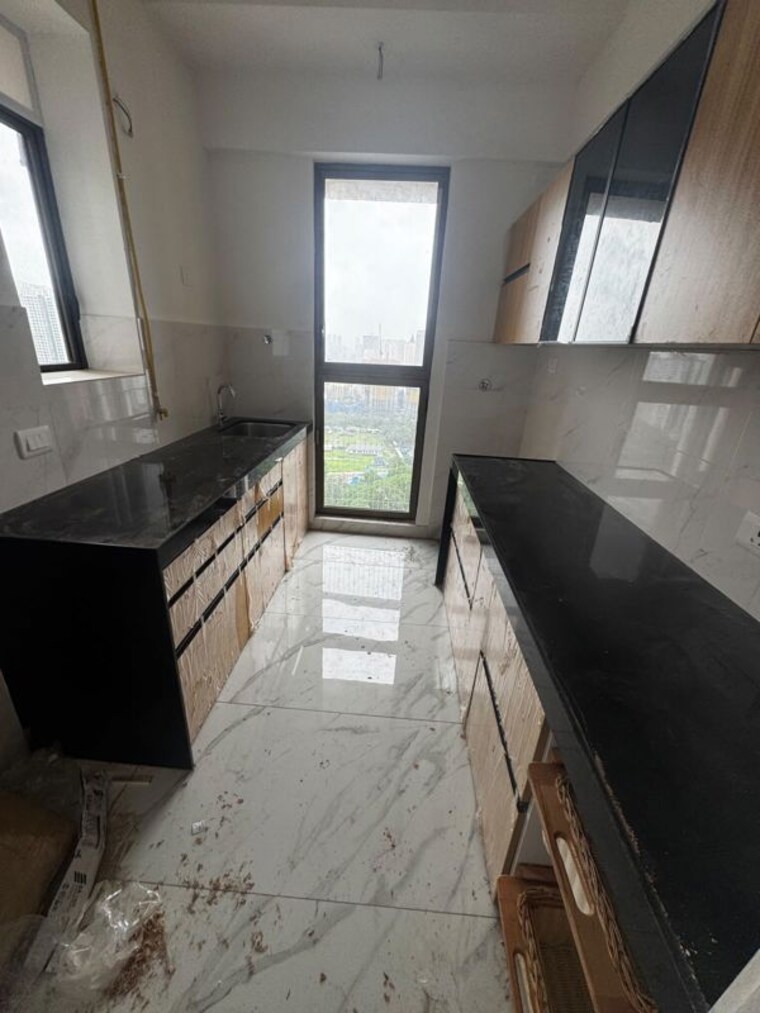 Kitchen, raymond-ten-x-habitat 2 Bedroom 515 Sq.Ft. Apartment In Pokhran Road No Two Thane 10587763