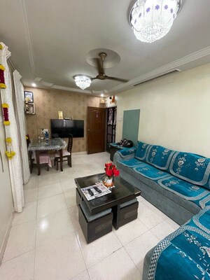 Living Room in 2 BHK Apartment at Shanti Heights, Kothrud – for Rent