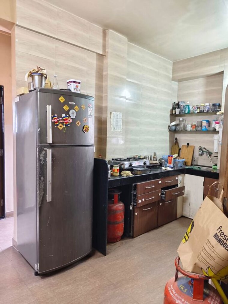 Kitchen, shri-chintamani-apartment 2 Bedroom 850 Sq.Ft. Apartment In Kothrud Pune 10587793