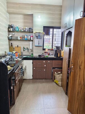 Kitchen in 2 BHK Apartment at Shri Chintamani Apartment, Kothrud – for Rent