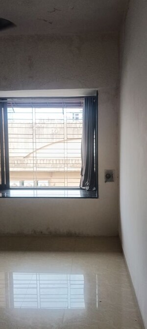 Bedroom in 2 BHK Apartment at Oshiwara Mhada, Andheri West – for Rent