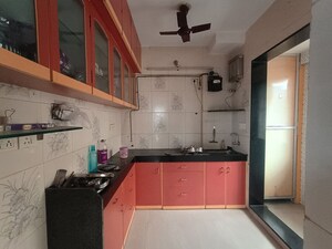 Kitchen in 1 BHK Apartment at Suyash Tower, Kopar Khairane – for Rent