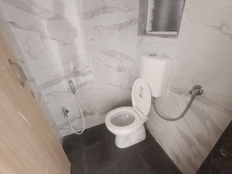 Bathroom, aanand-jai-bhavani-chs-ltd-sra-project 1 Bedroom 309 Sq.Ft. Apartment In Pokhran Road No Two Thane 10581623