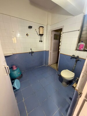 Bathroom in 1 BHK Apartment at Dosti Group Maitri Gardens, Oswal Park – for Rent