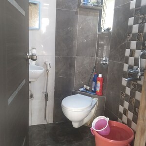 Bathroom in 1 BHK Apartment at Tulsi Sonata, Sai Nagar – for Rent