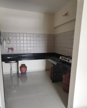 Kitchen in 2 BHK Apartment at Mahalunge – for Rent