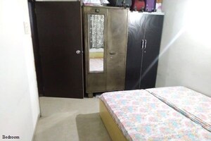 Bedroom in 2 BHK Apartment at Swaraj Complex, Wadgaon Sheri – for Rent