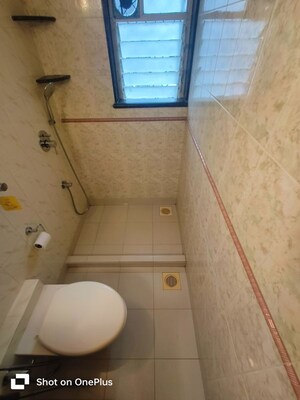 Bathroom in 2 BHK Apartment at Kalpana CHS, Bandra West – for Rent