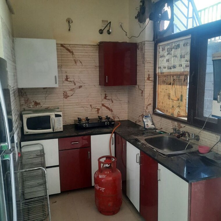 Kitchen, bajwa-sunny-enclave 2 Bedroom 900 Sq.Ft. Builder Floor In Jandpur Chandigarh 10588126