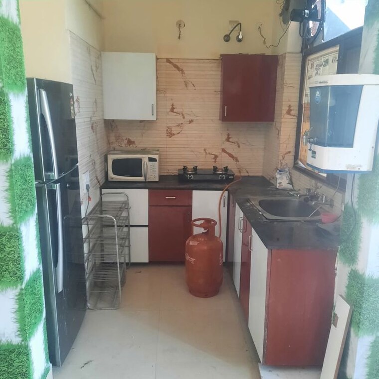 Kitchen, bajwa-sunny-enclave 2 Bedroom 900 Sq.Ft. Builder Floor In Jandpur Chandigarh 10588126