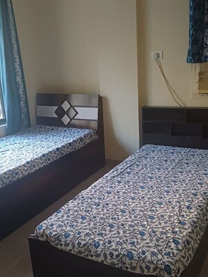 Bedroom in 2 BHK Apartment at Eden Woods complex, Manpada – for Rent