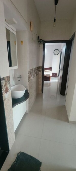 Bathroom in 2 BHK Apartment at Cosmos Lounge, Manpada – for Rent