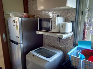 Living Room in 2 BHK Apartment at Supreme 19, Lokhandwala – for Rent