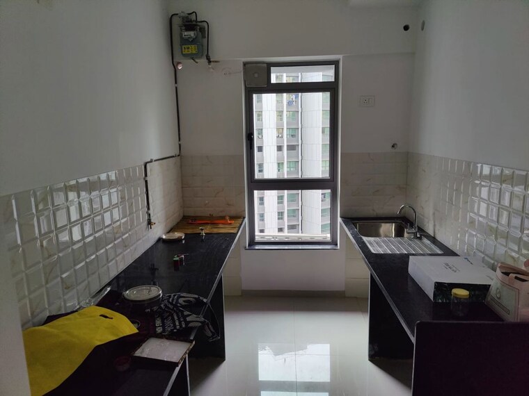 Kitchen, kalpataru-immensa 2 Bedroom 632 Sq.Ft. Apartment In Kolshet Road Thane 10588388