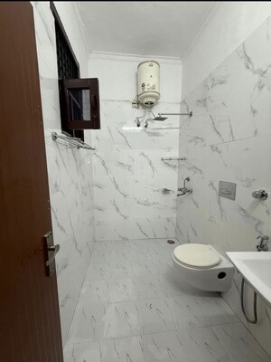 Bathroom in 2 BHK Builder Floor at Dhakoli – for Sale