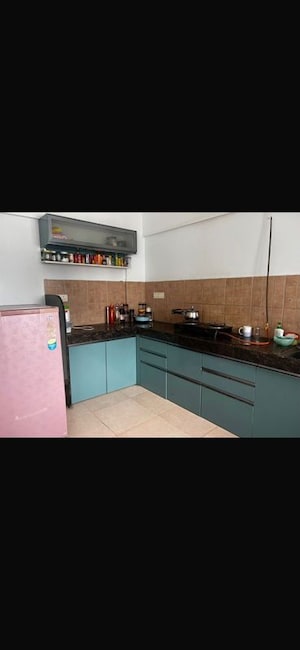 Kitchen in 3 BHK Apartment at Gera Emerald City, Kharadi – for Rent