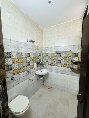 Bathroom in 2 BHK Builder Floor at Dhakoli – for Sale