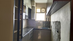 Kitchen in 3 BHK Apartment at Adore Happy Homes Pride, Sector 75 – for Rent