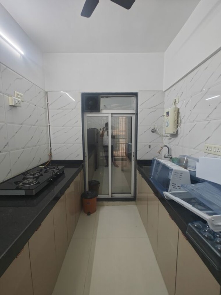 Kitchen, laxcon-plaza 2 Bedroom 1300 Sq.Ft. Apartment In Nerul Navi Mumbai 10588476