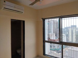 Room in 1 BHK Apartment at Chandak Nishchay, Borivali East – for Rent