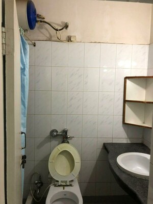Bathroom in 3 BHK Apartment at Sahadeo Heights, Aundh – for Rent
