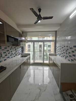 Kitchen in 3 BHK Apartment at Seawoods Sector 40 – for Rent