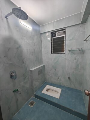 Bathroom in 3 BHK Apartment at Seawoods Sector 40 – for Rent