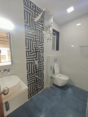 Bathroom in 3 BHK Apartment at Seawoods Sector 40 – for Rent