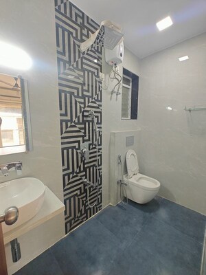 Bathroom in 3 BHK Apartment at Seawoods Sector 40 – for Rent