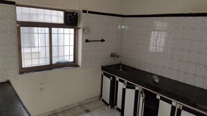 Kitchen in Studio Independent House at Raviraj Patang Plaza, Katraj – for Rent