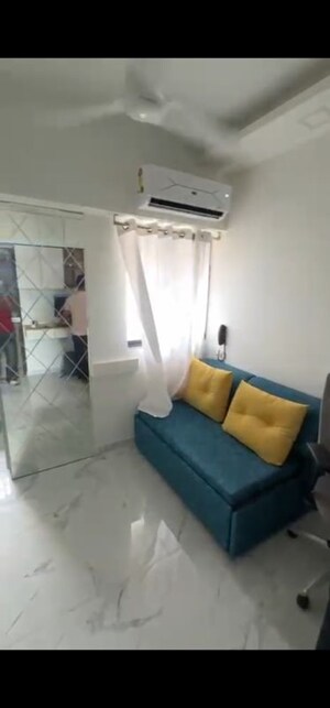 Living Room in 1 BHK Apartment at Promesa Midtown, Ghatkopar East – for Rent
