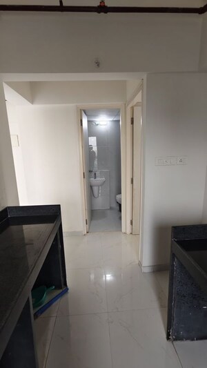 Bathroom in 2 BHK Apartment at Runwal Gardens Phase 2, Dombivli East – for Rent