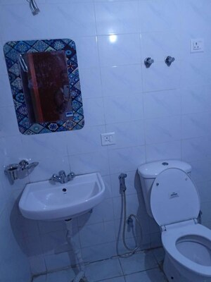 Bathroom in 3 BHK Apartment at Shri Radha Aqua Garden, Sector 16b Greater Noida – for Rent
