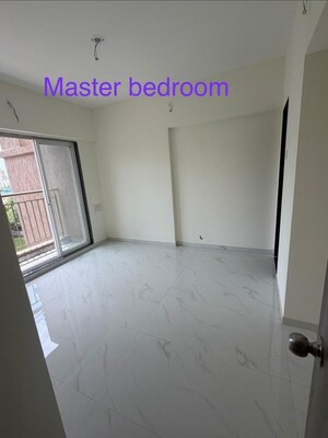 Bedroom in 2 BHK Apartment at Anant Metropolis Insignia Towers, Kasarvadavali – for Rent