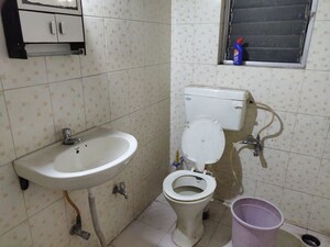 Bathroom in 2 BHK Apartment at Kumar Girija Shankar Vihar, Karve Nagar – for Rent