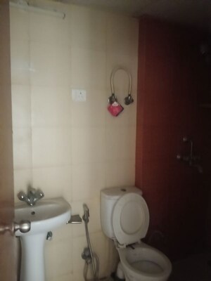 Bathroom in 3 BHK Apartment at Mahagun My Woods, Sector 16c Greater Noida – for Rent