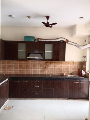 Kitchen in 3 BHK Apartment at Mahagun My Woods, Sector 16c Greater Noida – for Rent