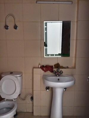 Bathroom in 3 BHK Apartment at Mahagun My Woods, Sector 16c Greater Noida – for Rent
