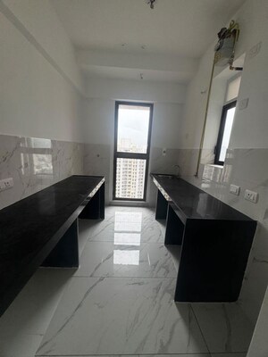 Kitchen in 1 BHK Apartment at Raymond Ten X Habitat, Pokhran Road No Two – for Rent