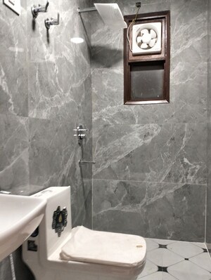 Bathroom in 4 BHK Builder Floor at Khirki Extension – for Rent