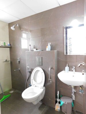 Bathroom in 3 BHK Apartment at Ambience Courtyard, Manikonda – for Rent