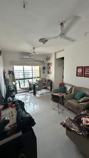 Living Room in 1 BHK Apartment at Sheth Vasant Oasis, Andheri East – for Rent