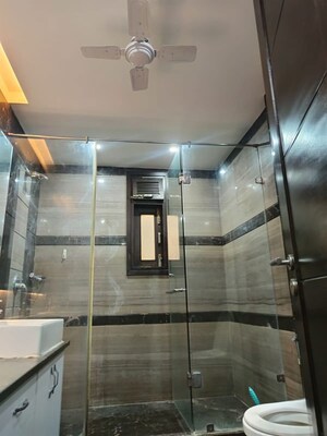 Bathroom in 4 BHK Builder Floor at East Of Kailash – for Rent