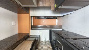Kitchen in 1.5 BHK Apartment at Atul Blue Fortune, Andheri East – for Sale