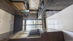 Kitchen in 1.5 BHK Apartment at Atul Blue Fortune, Andheri East – for Sale